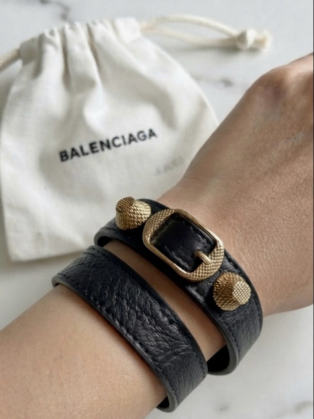 Balenciaga Black wrap around leather bracelet with gold accents